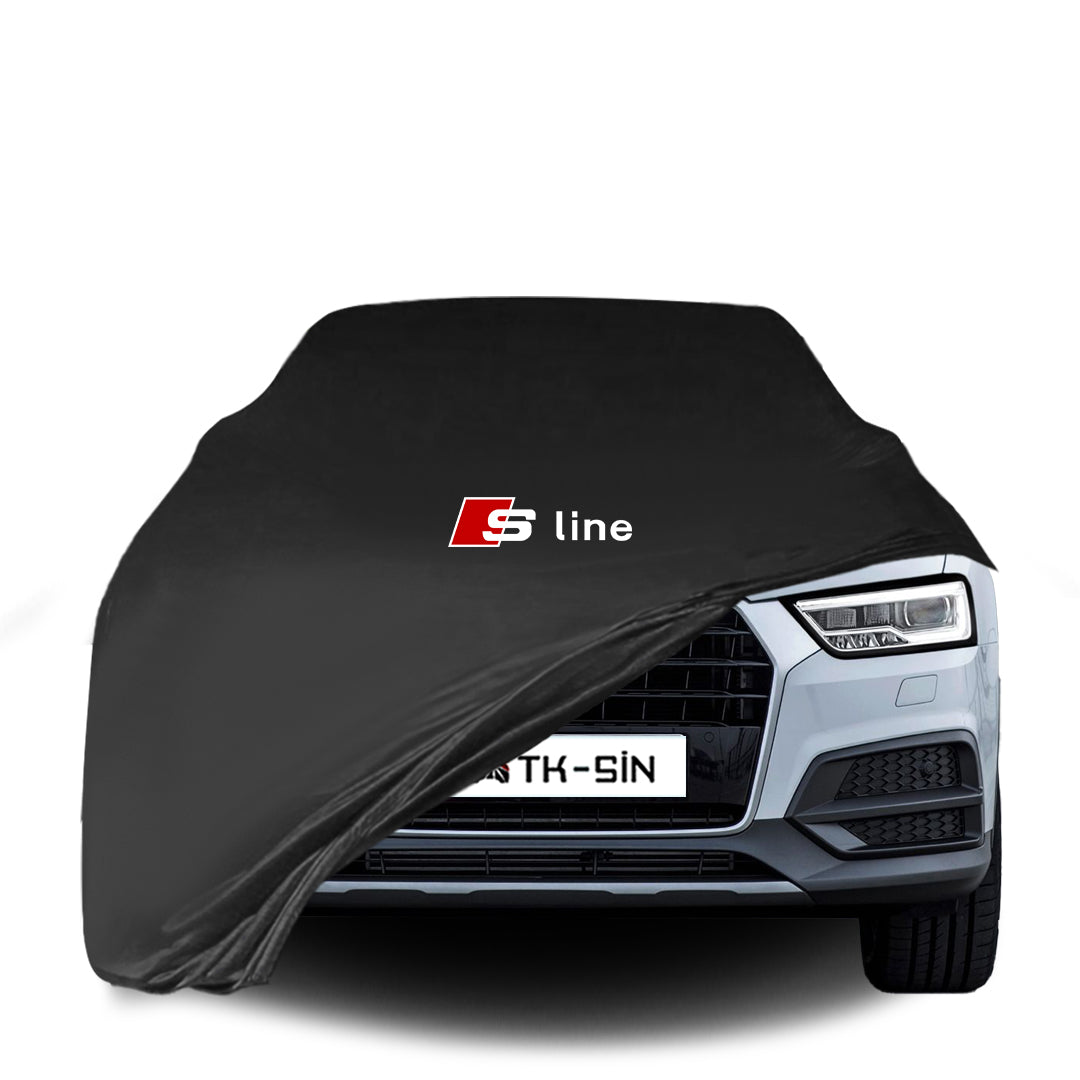 Audi Q3 mit maßgeschneiderter Indoor-Autoabdeckung in einer Garage in Deutschland