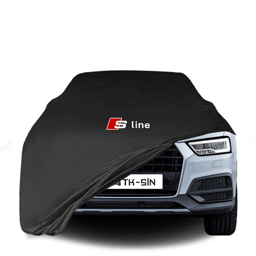 Audi Q3 mit maßgeschneiderter Indoor-Autoabdeckung in einer Garage in Deutschland