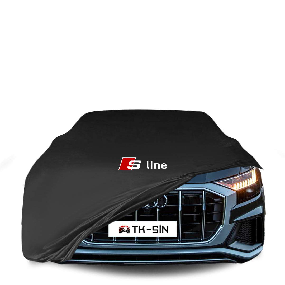 Audi Q8 mit maßgeschneiderter Indoor-Autoabdeckung in einer Garage in Deutschland