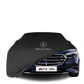 Mercedes-Benz E-Klasse T-Modell (S214) mit maßgeschneiderter Indoor-Autoabdeckung in einer Garage in Deutschland