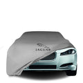 Jaguar XF mit maßgeschneiderter Indoor-Autoabdeckung in einer Garage in Deutschland