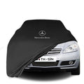 Mercedes-Benz A-Klasse (C169) mit maßgeschneiderter Indoor-Autoabdeckung in einer Garage in Deutschland