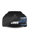 Mercedes-Benz E-Klasse (W213) mit maßgeschneiderter Indoor-Autoabdeckung in einer Garage in Deutschland
