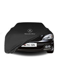 Mercedes-Benz S-Klasse (W221) mit maßgeschneiderter Indoor-Autoabdeckung in einer Garage in Deutschland