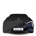 Mercedes-Benz E-Klasse (W214) mit maßgeschneiderter Indoor-Autoabdeckung in einer Garage in Deutschland